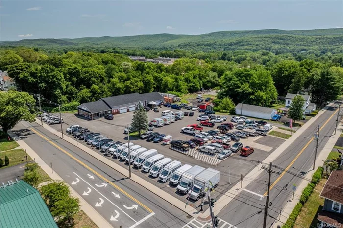 Introducing a prime commercial listing at 73 Kingston Avenue, Port Jervis, NY! This bustling corner lot spans an impressive 1.95 acres, offering a world of possibilities for entrepreneurs and businesses alike. Situated in a service commercial district, this property boasts a range of potential uses, including but not limited to convenient stores, business services, health and fitness centers, and wholesale and retail establishments. Furthermore, conditional uses can be explored, providing even more flexibility for your venture. Convenience is key, as this location is in close proximity to train stations and schools, ensuring a steady flow of foot traffic and potential customers. Additionally, ample parking space is available, catering to the needs of both employees and visitors. The property comprises four separate lots, currently featuring a well-maintained 4000 sq foot auto repair shop complete with a five-bay garage. This existing structure presents a fantastic opportunity to seamlessly transition into your desired business or be repurposed to suit your specific needs. Don&rsquo;t miss out on this exceptional commercial offering in Port Jervis, NY. Embrace the potential and envision the success that awaits in this thriving community. Contact us today to explore this remarkable opportunity and make your entrepreneurial dreams a reality.