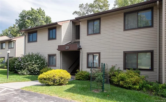 Welcome to the Commons at Cedar; a lovely community tucked away on Poughkeepsie&rsquo;s beautiful southside where you will find tree-lined streets and useful sidewalks. This second floor, garden style unit boasts one of the most desirable locations within the community, as it backs up to the Vassar Farm & Ecological Preserve. Take in lush greenery and the active wildlife from your own balcony. As you approach the front of the building, you are welcomed by attractive plantings. The assigned parking spot is just steps away from the entry staircase. As you open the door and step into the foyer, you will fall in love with the open, flowing floor plan. The spacious living room offers sliding glass doors out to the balcony and flows seamlessly into the formal dining area. The wall from the dining room into the kitchen has been opened up providing easy access into the kitchen making it feel like one continuous space while at the same time offering separate casual and formal dining spaces. The kitchen offers loads of cabinetry and more than ample counter space. You will be impressed with the storage space throughout. There is a large storage closet, a walk-in closet in both bedrooms and a wall of closets off of the entry. The main bath is tasteful and bright. There is also an additional, private half bath in the primary bedroom. Laundry is conveniently located off of the main bathroom. If you wish to partake, this community offers numerous social events and provides many opportunities to mingle with your neighbors and make new friends. Enjoy a beautiful clubhouse, gorgeous pool and tennis/pickleball courts. Conveniently located close to the train station, public transportation, shopping and all amenities.