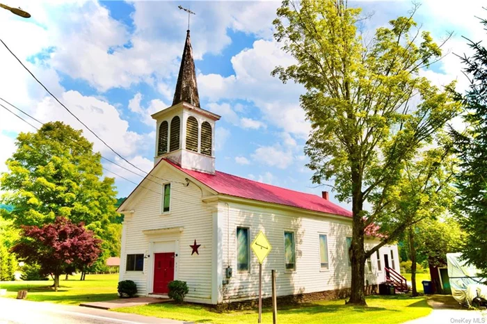 A Unique Artist&rsquo;s Haven in the Catskills: A Creative Sanctuary Awaits! Calling all artists, craftsman, photographers, tech creatives and folks seeking a flexible work / live space to utilize this old church building to live your dream of low stress creative living in the Catsikills. Perfectly situated equidistant to the thriving towns of Livingston Manor, Roscoe and Callicoon, this recently renovated structure blends one part NYC apartment with a giant work / flex space that offers one their own personal sanctuary to work and play as they see fit. Finely crafted built in cabinetry, beautifully realized pickled white original wood flooring, an amazing chef&rsquo;s kitchen, inspiring stained glass and even a giant old bell in the steeple that begs to be rung again! Tastefully considered appointments and design choices throughout but not so precious as to discourage exploration, this truly unique offering drips with potential for a new owner to operate on the next level. A rare opportunity for the right person to realize a exceptional life in a rural environment with enough room to let your ideas run wild! Come out for a look and let your next chapter begin!