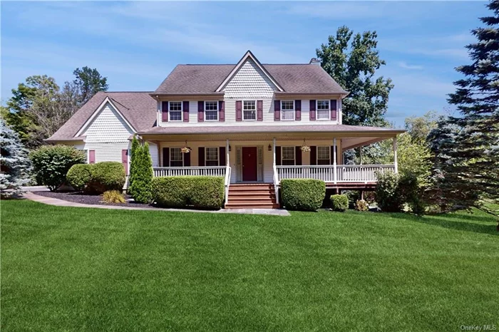 Discover this charming 4-bedroom 2 1/2 baths, 3078 Sq Ft home on 1.57 acres minutes from the quaint Village of Pawling. At entry, you will step onto a beautiful wrap-around front porch, perfect for enjoying your morning coffee or unwinding in the evening. The inside foyer leads you to this bright first level, where a spacious double-sized family room awaits. Abundant natural light floods the space, highlighting the beautiful hard wood floors & propane fireplace that adds both ambiance and warmth during the winter months for those cozy evenings, especially during the holiday season. Off the living room is a SGD leading you to a newly rebuilt deck, offering peaceful views of the large and well manicured yard an ideal spot for outdoor gatherings, yard games or just quiet reflection. The kitchen features granite countertops, pecan cabinets with soft-closed drawers, a convenient pull-out cabinet, and a tiled floor. Conveniently located next to the kitchen is the dining room, also with hard wood flooring.  On this level, is direct entry to the 2-car garage and a dedicated laundry area adding to the home&rsquo;s functionality. Moving to the upper level, the large primary bedroom features both a walk-in and a spacious double closet. The private bathroom has a double sink vanity, soaking tub, and separate shower. Additionally, there are 3 additional bedrooms one of which is very generously sized. Finally, the hall bathroom shows another double sink vanity with tub/shower.  On the lower level, there is approximately 630 sq ft. of wonderful living space in addition to a large separate storage area. This finished basement features a wet bar and a sliding glass door leading you to an ample stone patio giving you more outdoor space to enjoy. The combination of a level yard and a wooded area creates a serene and picturesque environment. Whether it&rsquo;s for relaxing, outdoor activities, or simply enjoying the view, such a setting offers a wonderful escape into nature. For a small fee enjoy summer swimming or camp for the kids at Lakeside Park only 6 minutes away. Winter fun is offered at Thunder Ridge Ski Area to ski or snowboard. This home offers the perfect blend of classic charm and modern convenience, creating a warm and inviting atmosphere for you and your family. Conveniently located minutes to Metro North, Golf courses, Rail & The Appalachian Trail, restaurants and more.