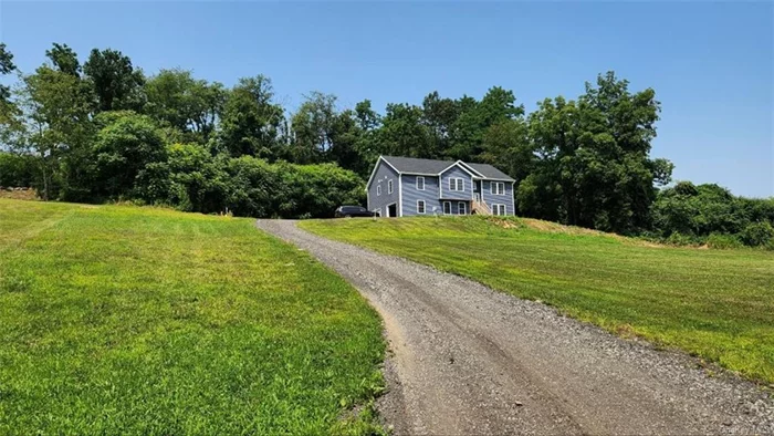 Large contemporary house with plenty of land, views, and space. Built three years ago, no old-home worries here! Plenty of privacy but around the corner from 9W stores and access to i84, NYS Thruway, and Poughkeepsie station for you commuters. Grass for the kids to run in and fully finished walk-out lower story for an extra rec room or home office. Lovely sunrises from your future dine-in kitchen and living room. Spray foam insulation.