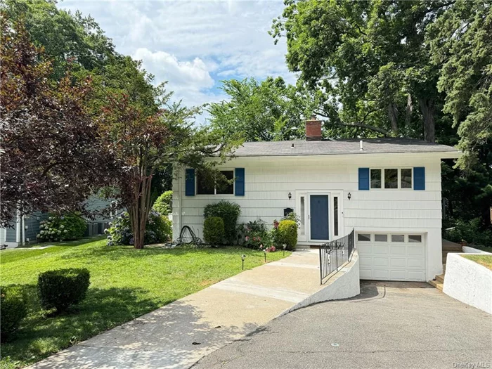 This spacious 4BR 2.5 BTH is located on the dead-end street and only a few blocks away from the train station and impressive heart of Larchmont. Very spacious Livingroom is sun-filled inside with cathedral ceiling, brick fireplace and sliding door to Balcony. Completely renovated high-end Eat-in-Kitchen with quartz island and all new Cafe stainless-steel appliances. Renovated Bathroom and 3 double size Bedrooms on the main level. The lower-level features Family room and another spacious Bedroom (could be Primary Bedroom) with sliding door to the patio and backyard with a door to connecting Bathroom, and Den or #5 Bedroom. Great features for outside entertainment with 3 sliding doors to access outside such as Living room to Balcony, Dining room to Deck, and Bedroom to Patio and fenced-in private Backyard. Next to the Pine Brook Park and playground with an access the stairs in front of this property.