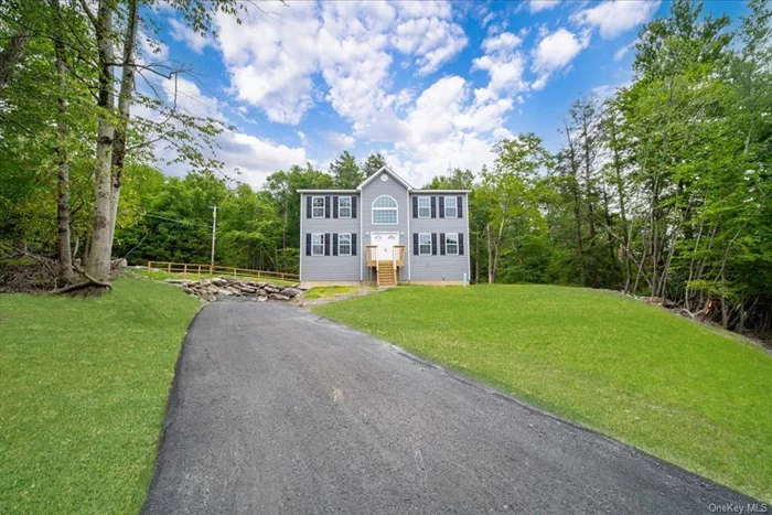 Sandy beaches, pristine lakes, sparkling pools, and crisp mountain air. Welcome to Emerald Green and the Sullivan County Catskills.  44 Club Lane is a newly built, center hall colonial located on a tree-lined street. The house features 2, 313sf with 4 bedrooms & 2 1/2 bathrooms, plus an un-finished basement and a two-car garage. A smart floorplan with spacious rooms, central heating/air conditioning, quartz countertops, hardwood floors, and ample closet space all add to the functionality of this house, which will soon be called home. Situated on a generous 0.40-acre lot, there is room for everyone to enjoy the peaceful setting.  The main level features a captivating foyer with soaring double height ceilings and oversized windows. The chef&rsquo;s kitchen offers quartz countertops, an island with a breakfast nook, and plenty of space for a table. A sliding door leads out to the deck and backyard allowing for the perfect flow of indoor-outdoor entertainment. The massive dining room can easily accommodate a table for the whole family. There is a large living room, as well as a bonus room which can be used as a family room, guest room, or home office. There is also a half bathroom on this floor.  The upper level has four bedrooms, a hallway bathroom with a tub, and a laundry closet. The primary bedroom is very spacious, and it features vaulted ceilings, a walk-in closet, and a full bathroom.   The un-finished, walkout basement offers additional space for recreation, a playroom, or storage. The two-car garage can easily accommodate two large vehicles, as well as shelves for all your storage needs.   Emerald Green is Sullivan County&rsquo;s premier private community. It offers two new pools that are located at the lakeside sand beach. There are three lakes for boating (non-gas boats only) fishing, and swimming. Boat slips are available for rent. There are also communal playgrounds, basketball courts, tennis courts, pickleball courts, a dog run, and an indoor clubhouse with a gym and walking track. Emerald Green offers community events such as holiday celebrations, seasonal fireworks, children&rsquo;s activities, exercise classes, game nights, etc. It is the perfect way to experience quiet country living in a friendly and serene neighborhood setting. This property offers the benefits of municipal water and sewer, as well as road maintenance and snowplowing provided by the town.   Rock Hill is the perfect place for a country getaway or full-time home. With its small-town charm, convenient shopping options, and proximity to the city, this is the place to be in Sullivan County!  * Please note that this house is currently under construction. The photos and floorplans are from recently completed houses by the same builder and will look very similar to the finished house but may not match exactly. Furnished photos are virtually staged. Occupancy expected September 2024.  ** The listed annual real estate taxes are estimated based on similar houses that were recently built in the neighborhood.