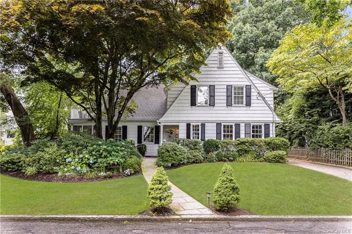 Location, Location, Location! This super charming 1920&rsquo;s farmhouse colonial is set on a flat well landscaped parcel at the end of a quiet cul de sac in the Bronxville Field Club area of Mount Vernon. And the inside does not disappoint for its floor plan and finishes. The gracious center hall boasts beautiful wainscoting elevated by fresh new Schumacher grass cloth and a lovely built in window seat. Beyond the center hall, the living room with fireplace enjoys three sunny exposures, new built ins and lovely access to a sweet screened in porch for three season living. The spacious formal dining room with original corner cabinets leads to a super sleek cooks kitchen with Wolf range, Sub Zero wine fridge and farm sink. A sensible mudroom and darling refreshed powder room complete the 1st floor. Upstairs, the large primary BR has been enhanced by a walk in closet with new hardware and built ins designed by Christopher Peacock and an adjoining bath refreshed with gorgeous William Morris wallpaper. There are 2 more family BRs and a sleek hall bath plus a 4th bedroom which now functions as a perfect office with fireplace and a door to a private porch. A small windowed room on the second floor provides great options for an office/gym/or potential third bath. All this plus a fabulous fully fenced flat play yard on a bike riding street. Will not last!