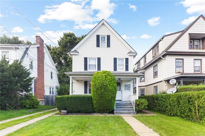 Welcome to 27 Colonial Place, a beautiful turn-key Colonial in New Rochelle, offering modern living with a blend of classic charm. This 4-bedroom, 2-bathroom home boasts 2, 000 sq ft of thoughtfully updated interiors, including stunning hardwood floors throughout, a spacious kitchen equipped with sleek stainless steel appliances. High ceilings enhance the airy ambiance, while the finished basement and walk-up attic provide additional versatile spaces for relaxation or work.  The luxurious bathrooms feature stylish, modern finishes, and the home benefits from a brand-new heating & cooling system, ensuring year-round comfort. Enjoy the private backyard, perfect for weekend BBQs or unwinding after a long day. Plus, the home is conveniently located within walking distance of the train, offering easy commutes.  With low taxes, modern amenities, and exceptional living spaces, this home is move-in ready and awaiting your personal touch. Don&rsquo;t miss out on this gem schedule a viewing today!