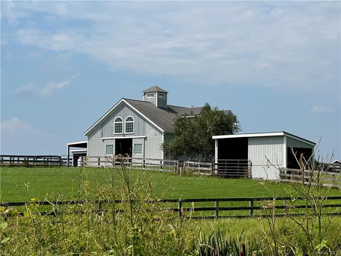 YEARLY RENTAL. A unique opportunity to rent and board your horses. This charming one bedroom barn apartment provides a spacious great room with updated kitchen and a light filled living room. The full bath has a stackable washer and dryer. There is high speed internet plus beautiful cathedral wood ceilings and laminate floors throughout. A large deck offers beautiful farmland views and is the perfect location for outdoor dining. The horse facilities include the five-stall barn below the apartment with a feed room, tack room, wash stall and heated stalls; generator for the barn; 4 paddocks with run-in sheds for each and electric heated waterers; and a thousand acres to ride on. A wonderful offering to keep horses where you live.