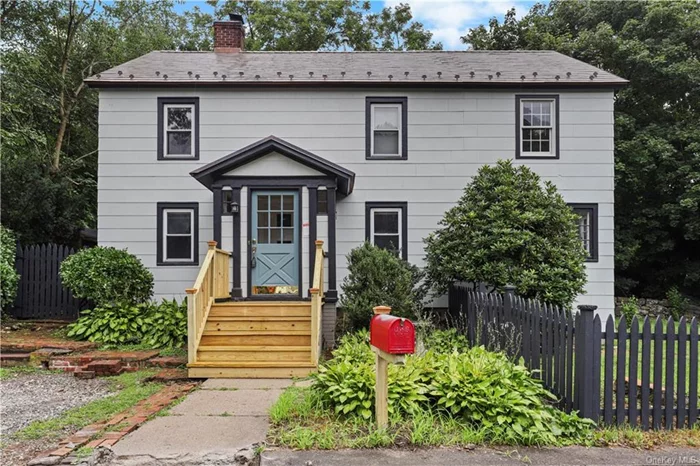 Sought-After In-Town Living! This charming Circa 1930 Colonial is just a few minutes walk to trains, shops, restaurants and town park! Renovated and expanded. Special features include fireplace, hardwood floors, enclosed sunroom, large dining room with corner cabinet, many built-ins, claw-foot tub in master bath, brick patio with new pergola, deck and new storage shed. In-Town Living at its Best!!