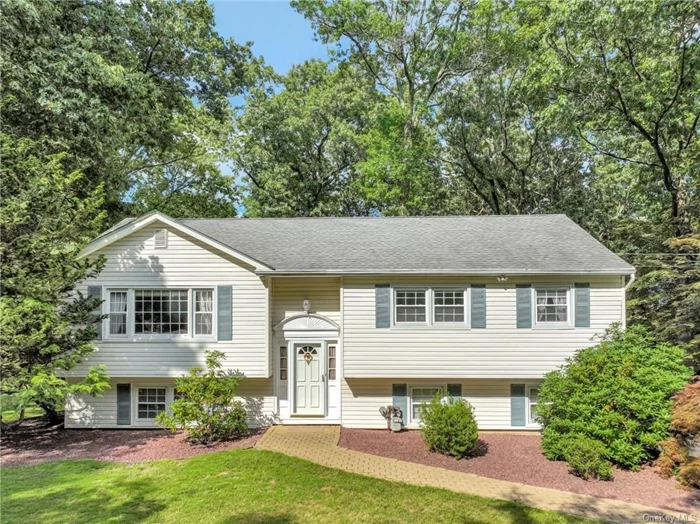 LOCATION, LOCATION, LOCATION! This very well maintained Raised Ranch is situated on one of the most picturesque tree lined streets in desirable Village of Chestnut Ridge. This beautiful home sits on just under three quarters of an acre and boasts many updates throughout. As you enter you instantly feel at home, the main living space is bright and airy, complete with hardwood floors throughout, recessed lighting and new baseboards. It&rsquo;s renovated kitchen has an abundance of cabinets, granite countertops, filtered water at the sink, skylight that brings in so much natural light, stainless steel appliances and opens up to your formal dining room. Dining room has sliders to a large deck perfect for entertaining guests or enjoying your morning coffee. Deck overlooks a flat naturally private park like backyard that gives its new owner the space to create the backyard of their dreams. Back inside the main floor primary bedroom has lots of space for all your furniture and even a walk-in closet. The other 2 bedrooms are spacious and complete with multiple closets. Both bathrooms have been renovated with new vanities. On the lower level you will find a massive family room that gives way to so many possibilities, sliders to an outdoor patio, half bath, laundry room and 2 car garage with room for storage. This home is a commuters dream located seconds from the Garden State Parkway entrance, NYS Thruway and NJ border.