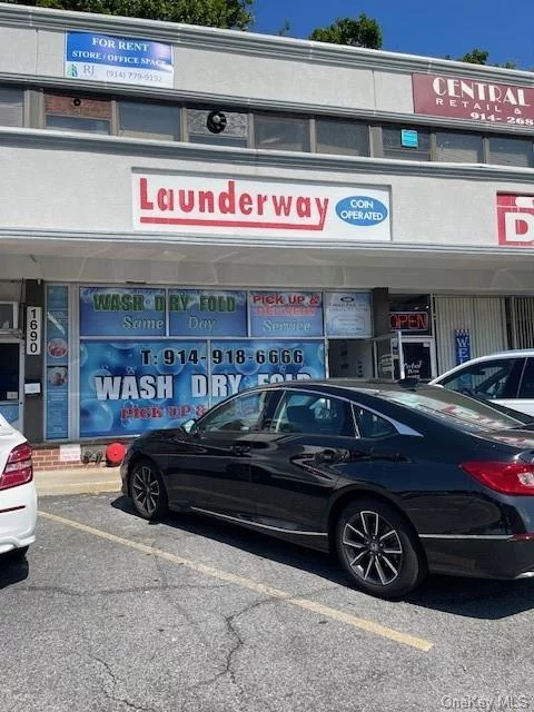 Location: This laundromat is strategically located in a bustling shopping center, attracting a steady stream of customers throughout the day. Its prime location ensures high foot traffic from nearby residential areas, retail stores, and office complexes, with parking most the time available,