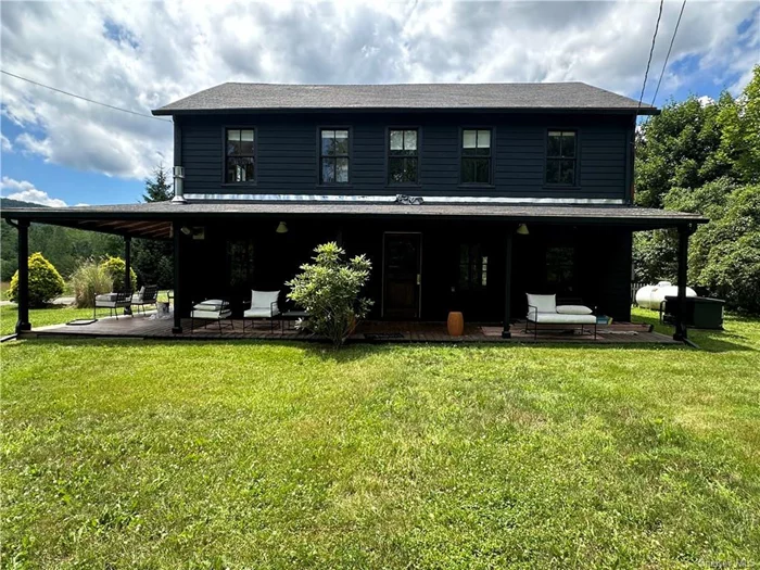 Chic, fully furnished single family rental! Experience the epitome of country living with this historic farm home nestled in the heart of the Catskill Mountains. This is the perfect opportunity to embrace the vacation lifestyle, all year round! With nearly 2000 sq ft of living space, this charming abode features 5 bedrooms and 3 full bathrooms, each thoughtfully updated over the years while still maintaining its rustic character with original hardwood floors and overhead wood beams. The sunny open-concept kitchen offers a delightful mountain view with sprawling meadow beneath. Glass French doors lead to a picturesque wrap-around porch while an additional door leads out to an expanded deck overlooking a large yard adorned with fruit trees, ideal for hosting BBQs or cozy evenings around the firepit. The first floor is complete with a full bath, bedroom, and family room. Ascend upstairs to discover 4 additional private bedrooms and 2 full baths, including one with a charming clawfoot tub and the other with a stand-in shower. The finished attic provides versatility as a play space, reading nook, artist&rsquo;s studio or whatever your imagination desires. Additionally, the newly renovated cedar barn offers nearly another 2000 square feet of usable space. On the first floor you have the convenience of a 2 car garage, full bath, and living space with radiant heat throughout the entire first floor. Make your way upstairs to a versatile entertainment area complete with bar and French doors leading out to a brand new deck with breathtaking mountain views. Walk out your front door, and you can enjoy the convenience of being a few steps away from Willow Trailhead/Mt.Tremper fire tower, one of the most famous Catskill hiking trails, or hop in your car and drive a short 7 miles to historic downtown Woodstock, or the adorable town of Phoenicia, while still being close to skiing, wineries, spas, shopping and top rated restaurants. Come and see this spectacular home for yourself, the pictures don&rsquo;t do it justice. Welcome to the best of both worlds! Home is also available for purchase MLS# 6301375