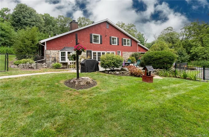 Serenity - This beautifully converted and renovated barn in Greenwood Lake, NY offers the perfect blend of rustic character and modern comfort designed to merge functionality and style, both inside and out. The interior boasts an updated kitchen equipped with modern appliances and thoughtful design touches. The dining area with a wall of windows offers a picturesque view of the yard and patio, creating a seamless indoor-outdoor living experience. Exuding warmth and charm is your living room with built-ins, a wood stove insert, and a pellet stove, all set against a backdrop of warm tones and exquisite woodwork - it&rsquo;s a perfect space for cozy gatherings or quiet evenings. Upstairs, you&rsquo;ll find a loft area that can be used as a reading nook, additional living space, meditation or yoga space, or any flex space you desire. There are 3 bedrooms, including a primary en-suite that offers a private retreat. An additional full bath upstairs adds convenience and comfort for family and guests. Nestled on one private acre, the property is adorned with a stone patio, stone walls, mature landscaping, a stone outbuilding, a shed for extra storage, a fire pit area for outdoor enjoyment, and a large fenced area for your furry friends. A carport provides protection for your vehicle, and a penned area ensures your pets have a secure place to play. The ample storage throughout the home and property ensures you have plenty of space for all your needs. This home combines the tranquility of rural living with the ease of nearby amenities and recreational opportunities. Enjoy boating and swimming in the summer, stunning foliage in the fall, skiing in the winter, and hiking in the spring. The area provides an easy commute to NYC, Rockland County, and New Jersey via car, train, or bus, making it a convenient yet serene place to call home.