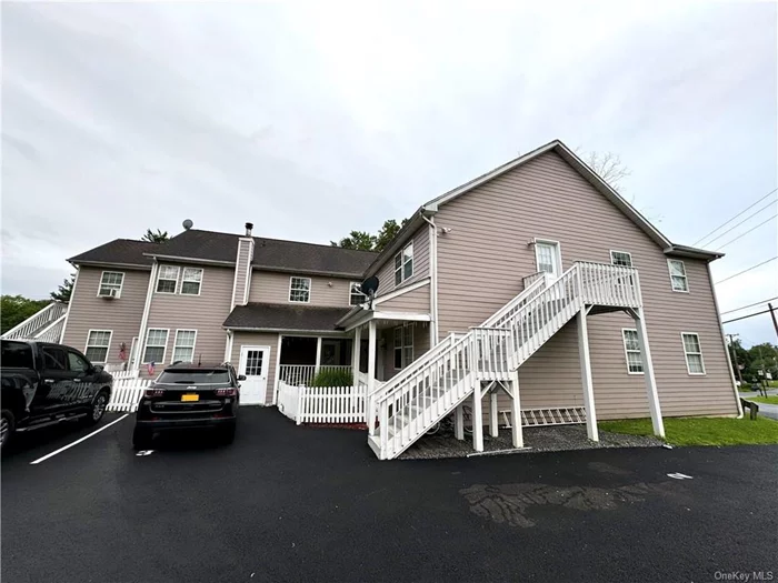 Enjoy the serenity of this spacious, light-filled, second floor two-bedroom apartment in a quiet, six-unit building. With its pristine oak floors, vaulted cathedral ceiling in the living room, and roomy bedrooms, you&rsquo;ll never want to leave home! Situated just minutes from I-84 and the Taconic State Parkway, the home is perfect for commuters. New modern ceiling fans keep you cool and a Nest thermostat keeps you warm. Kitchen features new quartz countertops and full-sized fridge, stove and dishwasher. Rent includes two reserved outdoor parking spaces, plus heat, hot water, trash removal, land care, and maintenance. Tenant pays for electric and cable/ internet. The common laundry room has 3 coin-operated washers and 3 dryers. Sorry, no pets. Bike storage is free in the basement. A roomy padlockable storage area in the basement is available for a small extra fee. Available August 1st.