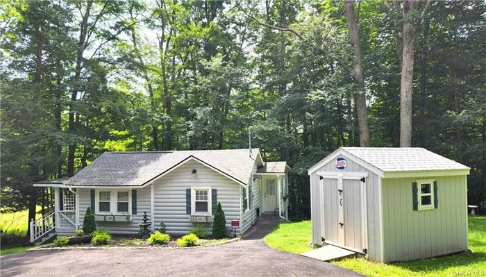 Charming 3 bedroom, 1 bath cottage in the popular lake communtity of Smallwood is now on the market. This year-round home is turn key and sits on over an acre of a lightly wooded forest with a seasonal stream toward the back of the property. Roof 5 years old, newly paved driveway, new vinyl replacement windows and doors, enclosed crawl space with vapor barrier currently being completed, new storage shed and new hot water heater and holding tank. Comes fully furnished with some personal items being taken. Easy one level living with open kitchen, dining space with beautiful wainscoting, stackable washer/dryer, large living room with cathedral ceiling and peaceful screened in porch overlooking the trees! Smallwood offers lake membership that includes the beach, Civic park with tennis, pickleball, basketball, childrens playground and clubhouse. Join the Club at Smallwood for heated pool, clubhouse and daily/nightly activities. Bring the pup to the Bethel dog park, hike the Forest Reserve and explore the picturesque waterfall. Nearby Bethel Woods, Delaware river, waterfront dining, antique shops, festivals and farmers markets. Call to take the tour!