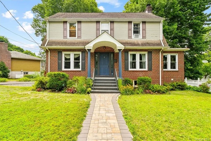 Welcome to this beautiful center hall colonial in the desirable Homefield neighborhood of Yonkers. This home boasts a spacious living room with abundant natural light, a cozy fireplace, and elegant hardwood floors, complemented by an inviting entry foyer. The formal dining room leads to a remodeled kitchen featuring granite counters, stainless steel appliances, and ample cabinetry. The first floor also includes a convenient half bathroom. Upstairs, you&rsquo;ll find four generously sized bedrooms and a full bathroom. The bonus full finished walk-up attic offers potential for expansion, while the full finished walkout basement, complete with a washer and dryer, provides additional living space. Outside, enjoy a large backyard with a paved patio area, perfect for entertaining. The property includes a driveway accommodating over six vehicles plus a two-car garage. Ideally located near Ridge Hill Shopping Center, Untermeyer Park, and just a 25-minute drive to Manhattan.