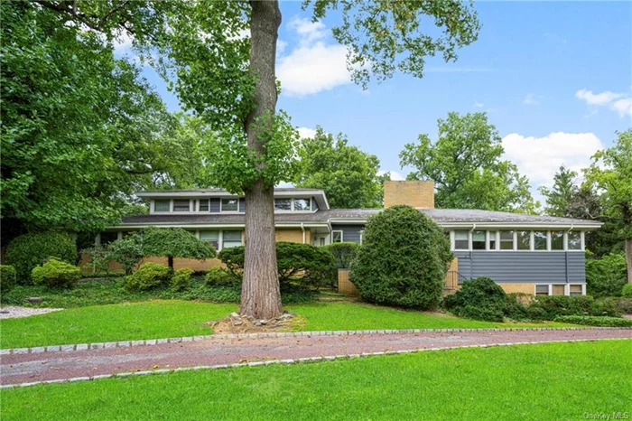 Own a piece of history in the sought-after Sterling Ridge/Trails neighborhood of Harrison. Designed by famed Architect Edgar Tafel, apprentice of Frank Lloyd Wright & on the market for the first time in 70 years, this timeless Mid-Century work of art was created to bring exterior elements of nature into its design & has been masterfully preserved in all its glory! This spacious home, perfect for entertaining,  features an oversized sunken LVRM w/floor-to-ceiling windows & fireplace, formal DNRM, office/den, 5 total BDRMS, 3 BDRMS on the main fl(incl primary ste) w/2 BDRMS upstairs, 4 full & 2 half bths throughout. Privacy & serenity abound on this property w/beautiful mature trees surrounding a semi-circular driveway, picture-perfect flagstone patio. Excellent construction, which spared no expense at the time, was built w/a discerning eye for design throughout this magnificent home which truly showcased the timeless Mid-century style. Bring your vision to update this amazing house