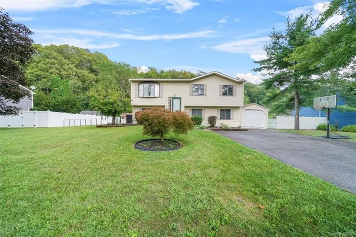 Discover the perfect blend of comfort and style in this impressive 2000+ sq ft raised ranch. This home offers a well-designed layout ideal for both everyday living and entertaining. The upper level features three generously sized bedrooms and a beautifully renovated full bathroom. The open-concept kitchen is a chef&rsquo;s delight, complete with a stylish eat-in island that flows seamlessly into the adjacent dining area. Entry through the decorative storm door leads you to an expansive deck, perfect for enjoying morning coffee or evening gatherings. The lower level is designed for versatility and relaxation, featuring a large living area, a full bathroom, and a fourth bedroom. This level also includes a convenient walk-out that leads to a private patio, creating an inviting space for outdoor living. The backyard is a serene retreat, complete with a relaxing atmosphere and an above-ground pool nestled on a quarter-acre lot. Additional features include a one-car detached garage and a spacious driveway.