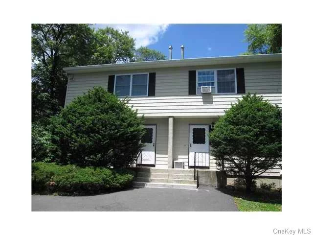 Bright and exceptionally spacious, this recently renovated trilevel townhouse-style 2-family duplex offers a unique living experience with no neighbors above or below. Nestled on a private, level half-acre lot set 200 feet off the road, this home features a stunning open floor plan complemented by recently refinished oak floors throughout. The main level boasts a beautifully updated eat-in kitchen showcasing elegant white shaker cabinets, granite countertops, a pretty ceramic tile floor and backsplash, along with updated appliances. Adjacent is a formal dining area that flows into a generously sized living room with sliders opening onto a deck overlooking the yard, ideal for outdoor gatherings and barbecues. There&rsquo;s also a tastefully updated powder room. Upstairs, three spacious bedrooms all on the same floor provide ample closet space, with the primary bedroom featuring an alcove perfect for a computer area and direct access to the updated full bathroom. There&rsquo;s plenty of closet space throughout and lots of storage space in the private full basement, which includes a washer/dryer for added convenience. And it&rsquo;s located in the highly regarded Clarkstown school district. A pet may be considered with additional rent. Positioned for an easy commute, the property is conveniently close to major parkways, NYC transportation, and lots of shopping. This meticulously renovated duplex offers a perfect blend of comfort, style, and convenience in a sought-after location. Photos taken before previous occupant. Don&rsquo;t wait!