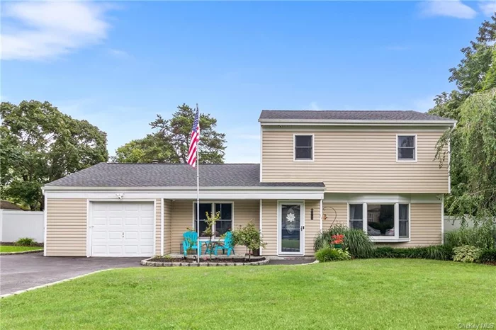 Welcome home to this well-maintained Old Westfield Center Hall Colonial style home featuring great curb appeal with a charming front porch, beautiful level fenced in property, sprinkler system, above ground pool with decking, solar panels and many recent updates including a new central AC installed within last 5 years old, roof, 330 g above ground oil tank, stainless appliances (stove, DW), 200 amp service, pvc fencing surrounding the yard, pool filter and solar panels (owned and paid in full). This fabulous updated home offers nice custom finishes with its crown molding, recessed lighting, 6 panel doors and more with a classic flow-perfect for entertaining, with a formal living room and formal dining room, powder room, large eat-in-kitchen with island, stainless appliances, quartz counters, tile black splash and open to the informal entertaining space with a slider allowing ez access to the large Belgian block patio/large pool/decking and plentiful yard-your own private oasis! The spacious first floor bedroom completes the main level and offers more space with so much potential to customize to your own desire. Upstairs you will find the primary bedroom, 2 additional bedrooms and a beautifully updated full bath. The multi-car driveway and convenient location make this home a must see-schedule a tour today!