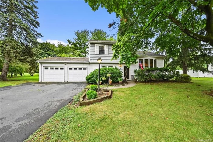 Welcome to this beautifully updated split-level home, offering over 1, 900 square feet of stylish living space on nearly half an acre in the highly sought-after town of Blauvelt. This residence seamlessly blends modern design with functional living, creating a perfect retreat just 30 miles from NYC. Step inside to find freshly painted walls and wide plank luxury vinyl flooring, setting a contemporary yet inviting tone throughout the first floor. The formal living room, just off the entry foyer, provides a cozy spot for relaxing with a good book or enjoying your favorite shows. A few steps up reveals an impressive family room, featuring cathedral ceilings and a large picture window that floods the space with natural light. Open to the formal dining room, this area is ideal for entertaining guests in style. The remodeled kitchen is a chef&rsquo;s dream, showcasing sleek maple cabinetry, granite countertops, and high-end stainless steel appliances, including an oversized, side by side refrigerator, cooktop, and double ovens. The raised deck is accessible from both the kitchen and dining room and offers a seamless flow for indoor-outdoor entertaining. This level also includes a versatile den, currently set up as a guest room, and a conveniently located powder room. Upstairs, you&rsquo;ll discover three comfortable bedrooms and a stunning, remodeled bathroom.  The finished lower level adds even more living space, with a cozy sitting or gaming room, a dedicated laundry area, and ample storage. A two-car garage with a bonus attic provides unexpected storage options at this price point.  Located in the highly-rated South Orangetown School District, this home combines suburban tranquility with easy access to the excitement of New York City. Don&rsquo;t miss your chance to make this exceptional Blauvelt property your own!