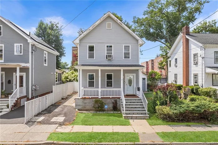 Unpack your bags and move right in to this spacious updated front porch colonial located in the heart of the Hudson Valley! This fabulous home presents great curb appeal with its charming front porch, fenced in yard, classic period architectural details and a modern flair with its many updates. As you enter, you will find a comfortable flow with all spacious and sunny rooms, living room & beautiful original moldings that is adjacent to the dining room open to the den/office area, powder room, large kitchen with convenient access to the laundry room and the door out to the level, fenced in rear yard. Upstairs you will find the primary bedroom, full bath, bedroom and access to the huge attic with 10&rsquo; ceilings (ready to be finished to add additional square footage). The basement offers plenty of storage, the mechanicals and a door out. And, the many updates over the years include: hardwood maple flooring, kitchen cabinetry, ship lap ceiling, tiled flooring, stainless appliances, both bathrooms, custom blinds, boiler, roof, siding, electric, plumbing/all pvc piping, windows, water proofing/drainage/sump pump, foam insulation in walls and generator hookup. Close proximity to all shops, restaurants, entertainment, metro north, bike path, parks, boating, fishing and water sport activities on the Hudson River. Less than one hour to NYC and centrally located in the Hudson Valley, this home is a must-see!