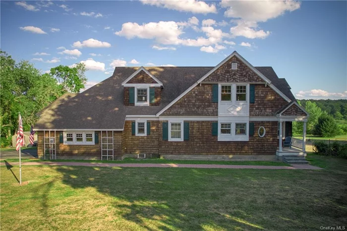 Beautiful custom built home at the foot of the Catskills! 5 bedrooms, 2.5 baths is surrounded by over 3 acres in lovely Sullivan County. 9&rsquo; ceilings, Great Room, eat in kitchen, family room, 1st Floor Primary bedroom with ensuite, walk in closet. 2nd floor has 4 large bedrooms, large storage closets, and craft room. 2 car attached garage, partially finished walk out basement with large rec room and workshop. Oversized 500 sq ft porch with beautiful panoramic views. First floor radiant floor heating, central vacuum. Plenty of space with beautiful surroundings in a convenient location. Woodbury Commons, LegoLand, Resorts World Casino, the Catskills and Poconos, Garnet Health Medical Center and Crystal Run Healthcare are just a short ride away. Get a taste of Hudson Valley country life in this award winning design by Robert A.M. Stern home.