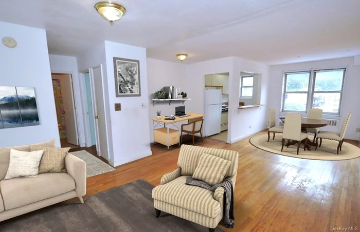 This Dog-Friendly 1-Bedroom, 1-Bath coop is just a 5-minute drive to Bronxville Village and Metro North commuter trains and offers an assigned Indoor Garage Parking Space, Visitor Parking and an In-Ground Pool for your summer enjoyment! The unit features a large living room that opens to a dining area and an extra nook that could make a great home office set-up. There&rsquo;s a pass-though window between the dining area and kitchen. There&rsquo;s also a large bedroom, bathroom and plenty of closets. Other nearby attractions include a Bus Stop for express commuting to NYC; numerous Shopping/Entertainment/Fitness Opportunities in Bronxville, on Central Avenue and at the Cross County Center. Palmer House offers storage options; a bike room and a laundry room. 1 Dog up to 25 lbs and 1 or 2 cats are allowed with board approval. Debt-to-income must not exceed 30%, credit scores must be 725 or above and a 20% down payment is required at the contract signing. Monthly maintenance does not include STAR.