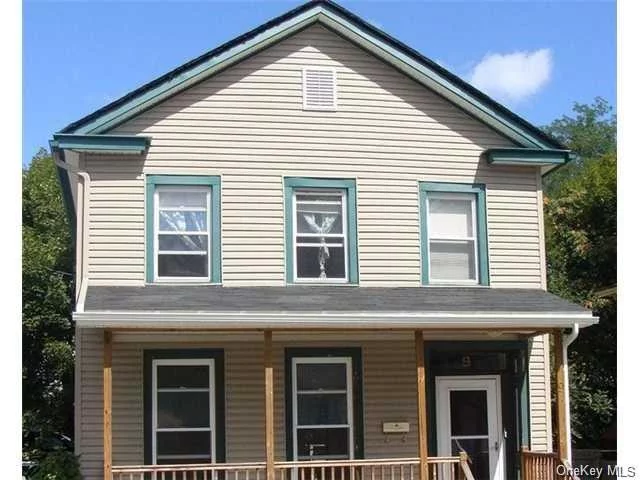 Within walking distance to NYC Metro North Train Station and the famed 40 miles of Watershed Hiking Biking Trails in the Renaissance City of Port Jervis with new upscale shops, eateries, antique shops, art studios, and brewery with White Water Rafting on the Wild and scenic Delaware river. This Home is perched uptown in quiet neighborhood and features 3 Large spacious Bedrooms and 2 Full Bathrooms on 1742 Square fee of living space. Eat in Kitchen with Granite Countertops with sliders to rear deck for outside entertainment. First Floor Bedroom along with living room and formal dining room. Very affordable and in good condition.