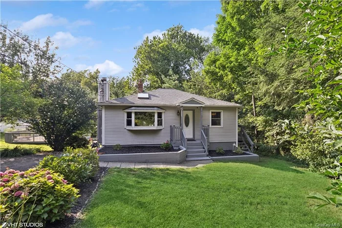 Charming ranch style home on over an acre of private property connecting to Fishkill Creek, a tributary of the Hudson River.  Sun-filled living room with skylight, wood-burning fireplace and bay window overlooking hydrangea, Rose of Sharon, apple, cherry and pear trees, and lilac; updated eat-in kitchen with stainless appliances, generous cabinets and drawer space, peninsula perfect for prep, and a sweet side porch for that morning cup of coffee. Two bedrooms on main level, and full bath with skylight and soaking tub. Lower level is perfect for guests and extended family visits, with third bedroom, large den with wood stove, and walk out to patio and level yard. Laundry room with shelving. Lower level offers additional space for storage or studio space. Venture out into expansive yard with enclosed garden and open storage shed for supplies. Walk down private path to the Fishkill Creek to relax and unwind. Updated windows, boiler and water heater. Survey available. Home has two driveways and an additional shed for storing bicycles and kayaks. Fishkill Ridge hiking trail at end of road, and minutes to Beacon&rsquo;s vibrant Main Street. Great commuter location!