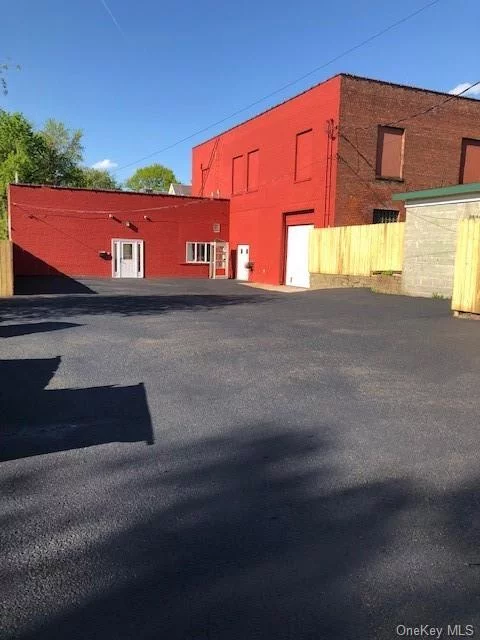 Discover the perfect blend of office and warehouse space with plenty of parking in this versatile commercial flex property. Located in the vibrant business district of Peekskill, this property offers an ideal solution for companies seeking a spacious, functional environment to support their operations. Minutes to Route 9 for easy commercial highway access. 3000 SF of warehouse with 1200SF of office with two bathrooms, shower, and kitchenet.  Parking for 6 vehicles.