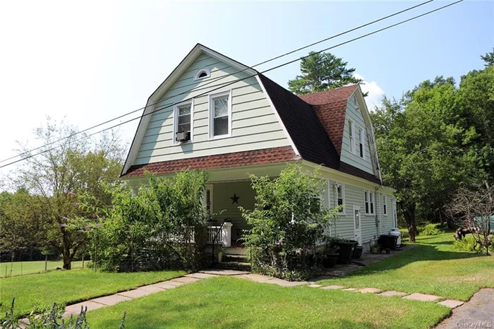 Charming Dutch Colonial with detached two-car garage, garden shed and chicken coop on 3.5 mostly cleared acres where a back portion of the land is wooded. This home, with its rocking chair porch, features 4 bedrooms and 1.5 bathrooms, has hardwood floors, lots of woodwork and an original staircase. The property has an orchard with abundant fruit trees, lots of perennial plantings plus a fenced-in garden. This country getaway is only minutes from Callicoon and would make a great mini-farm. Callicoon is a charming hamlet with numerous restaurants, shopping and access to the Delaware River.