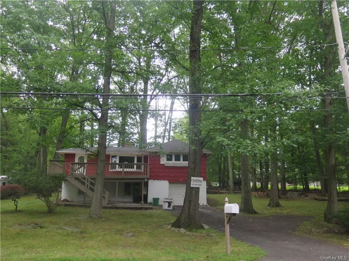 Beautiful, renovated, Spacious home with a ton of natural light through lots of windows. Open concept kitchen, dining room living room with recessed lighting, plenty of cabinets and granite counter tops. 3 nice size bedrooms and a full bathroom on the main level and additional 2 rooms, a family room and a full bathroom in the lower level. Electric fire place in living room. A large deck and a magnificent yard. Great privacy and views being across the lake and woods. Very close to the Palisade Parkway for an easy commute.