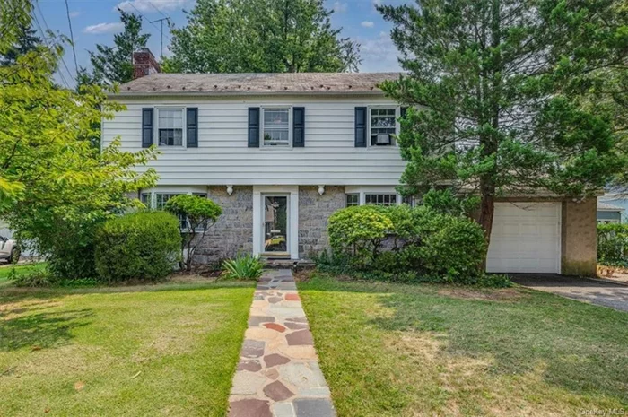 Welcome Home! A beautiful stone home in the Fleetwood section of Mt Vernon will turn heads! This two-story, classic colonial boasts a level, partially fenced back yard with plenty of patio space for hosting friends and family. The main level has hardwood floors, a spacious living room with a working fireplace, formal dining room, newly renovated 1/2 bath, and a greenhouse study. The kitchen and solarium flow continuously offering a chef&rsquo;s oven/stove, convection oven, d/w,  and ample cabinet space.  All four seasons are embraced while dining in the solarium. Both the art deco kitchen and solarium are tiled with medieval Italian roof tile, providing a flagstone feel and a piece of medieval history. The second floor has three large bedrooms, one flex room, and two full baths. The primary bedroom with en-suite full bath and walk-in closet. Even more storage space in the walk up attic that houses a cedar closet, and tons of space. The partially finished basement is spacious and offers an office and guest area as well as laundry, and a work area, all with a private entrance, plus a one car garage. This house is only 12 miles from Manhattan yet has all of the convenience of the city living.