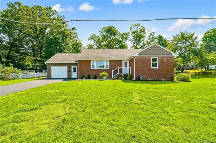 Look no further! This beautifully renovated ranch located in the highly sought-after Clarkstown School District is your dream home. This stunning property features great curb appeal with professional landscaping. Enjoy a level, fenced-in backyard complete with a new Trex deck and a cozy firepit. Inside, the open floor plan showcases a brand-new kitchen with custom cabinetry and a center island, stainless steel appliances, and quartz countertops. Additional updates include elegant bathrooms with mirrors with bluetooth and speakers, NEW double pane windows, flooring, plumbing, electrical systems, recessed lighting and a newly paved driveway. The full basement with a bonus room awaits your personal touch and creative vision. With boundless potential, this expansive space offers a wealth of opportunities to tailor it to your unique needs.Conveniently located near shopping, restaurants, schools, and with an easy commute to NYC, this move-in ready home truly has it all.