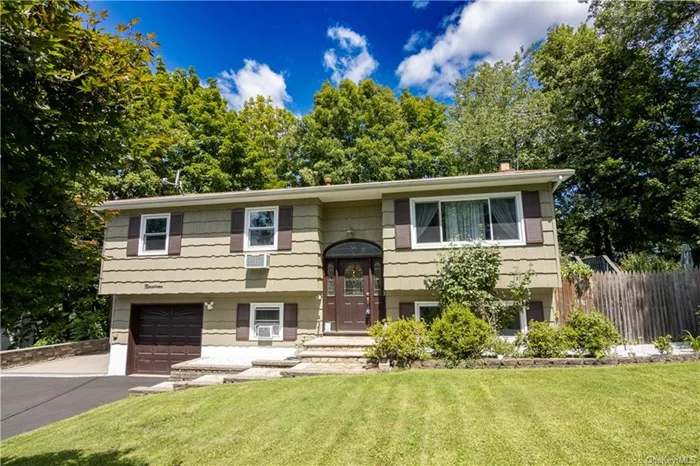 Welcome home to this sunny and bright raised ranch style house. Nestled on a lovely dead end street in the heart of West Nyack. Just a stone&rsquo;s throw away from Route 59, Thruway, PIP, and MC/TZ Bridge. This 4 Bedroom and 3 Bathroom house sits as if it is 5 Bedrooms. It has more than enough room for you and loved ones. A brand new driveway with pavers greet you at the entrance. A large open kitchen that spills over to the dining room, recently renovated bathrooms, wood burning fireplace and den/office space. Outside boasts a brand new Trex Deck overlooking the oversized fenced-in yard. Located in the highly sought after Clarkstown South School District w/ very low taxes to boot! Come enjoy ease & convenience for comfortable living w/ amenities such as the Palisades Mall right at your fingertips. This home has endless possibilities with additional space for in-laws or guests in the lower level. Brand new water heater tank and furnace have been recently installed for your peace of mind.