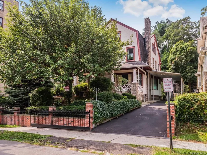 Step into the charm of this exquisite Victorian masterpiece! This elegant home welcomes you with a grand front porch and a spacious foyer adorned with stunning stained glass windows and beautiful woodwork throughout the home. The inviting living room and dining room both feature wood burning fireplaces, while the expansive kitchen boasts newer appliances, convenient washer/dryer. The first floor also includes a bonus room used as a breakfast room and has a full bathroom.  Marvel at the gorgeous staircases leading from both the foyer and kitchen to the second floor, where you&rsquo;ll find the Primary bedroom with his-and-her closets and a fireplace, alongside three additional bedrooms (one currently serving as an office) and a large full bath.  The third-floor unit offers a private retreat with its own kitchen, living room, bedrooms, and full bath, accessible via a separate back entrance. The basement features its own entrance and includes a utility/boiler room, a full bath, and three additional rooms for all your needs.  With a driveway providing space for 3-4 cars, you&rsquo;ll enjoy easy access to NYC buses on Broadway and Riverdale Ave, plus convenient transportation to NYC and White Plains. Recent updates include a new boiler, appliances, and fresh exterior paint. This home is a true gem that you must see to fully appreciate!