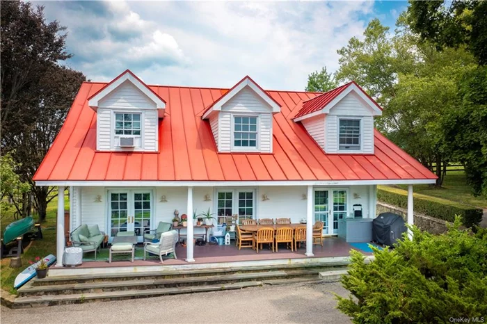 Now available for rent, this guest house is part of the prestigious Kirby Hill Farm on Quaker Hill, one of the Hudson Valley&rsquo;s most esteemed estates. This utterly charming Cape Cod-style home features three dormer windows and a classic red metal roof, all set on nearly 250 acres of a gentleman&rsquo;s horse farm. A gated entrance on Kirby Hill Road leads to a brick-paved driveway that opens into a circular driveway in front of the 2, 058 SF, 3 bedroom, 4 bath home. The 480-square-foot farmhouse-style front porch spans the entire length of the home, with three sets of French doors providing access to the interior. Inside, the crisp white walls and classic terracotta clay tiled flooring create a stunning contrast. The first floor boasts an open floor plan connecting the Scandinavian-inspired kitchen, a dramatic two-story dining room with an interior balcony, and a cozy living room. This level also includes an office area, a full bath, and a laundry/mechanical room. Upstairs, the steep roof and dormer windows add to the charm of each of the three bedrooms, each featuring its own attached full bath. Outdoor amenities include a tennis court adjacent to the home and ample yard space for recreation. As a rental on the grounds of Kirby Hill Farm, additional opportunities such as horse boarding, riding lessons, or enjoying a polo match may be available. The tenant is responsible for electric, propane (heat, hot water and stove), Comcast/Xfinity Business internet/cable, and tenants&rsquo; insurance. The landlord provides garbage, lawn, and snow removal. The landlord also provides a whole house generator (and diesel) for peace of mind during inclement weather. Located just minutes from the quaint Village of Pawling, residents can enjoy charming boutique shops, fine dining, fun eateries, pub, and a seasonal farmer&rsquo;s market. The Pawling Metro-North Train Station offers easy access to New York City, just 90 minutes away by train.