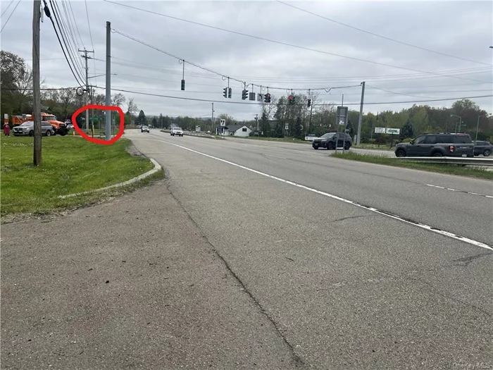 Just over TWO ACRES at a cornered TRAFFIC SIGNAL light off of Route 9 (Northbound). Zoned HB COMMERCIAL. Located in the TOWN OF WAPPINGER. Traffic count of 35, 000 VPD. Curb cut on Route 9: Route 9 is the main thoroughfare running North/South through Dutchess County. There is a small existing 781 sqft home on this parcel, (older structure/cabin) at the southeast corner of the lot. Rented monthly. SEWER and WATER located directly across Smithtown Rd. Zoned for RETAIL, RESTAURANT, AUTO SALES, OFFICE, WAREHOUSE, FUEL /GAS STATION CONVENIENCE STORE, CAR WASH and much more!!