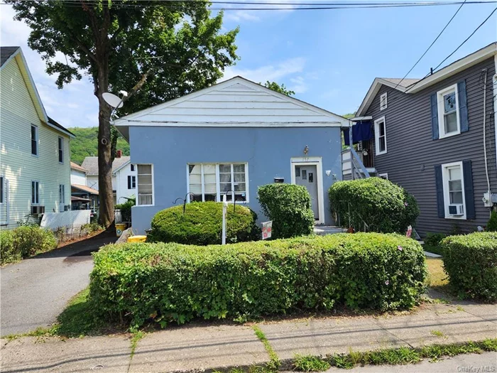 Discover this small 2-bedroom, 1-bathroom home nestled in the desirable West End area of Port Jervis. This cozy home, priced attractively for a swift sale, is a fantastic opportunity for both first-time buyers and seasoned investors alike. With a long-term tenant who has occupied the home for 13 years, this property also presents a seamless investment opportunity. Enjoy the convenience of being within walking distance to the majestic Delaware River, where you can indulge in serene river views and outdoor activities.