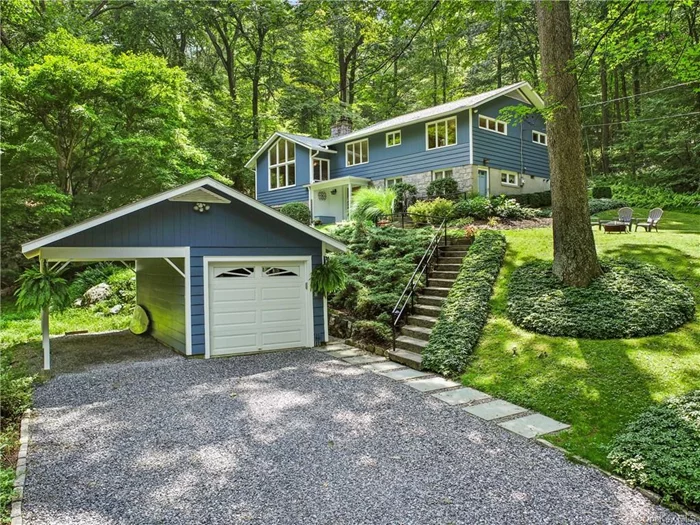 Lake Katonah living at its best! A vibrant community with private beach, sport courts, clubhouse and playground. Private setting surrounded by conserved lands. Peaceful and beautifully landscaped 1.34 acres with specimen trees, flowering shrubs, rolling lawns and a babbling brook. Warm and inviting split-level Colonial with light and airy rooms. Beautifully proportioned Living Room with vaulted, beamed ceiling, knotty pine paneling and a wall of windows. Open Dining Room with door to rear terrace for indoor-outdoor entertaining. Spacious Family Room with fireplace. Private Office for working remotely. Four Bedrooms include a Primary Suite with Bath. Beautifully maintained and absolutely turn-key. Lake Katonah is surrounded by 300 acres of the Bedford Audubon trails, within a mile of the elementary school which is part of the award-winning Katonah schools, a quick drive into Katonah village with it&rsquo;s shops and restaurants. Not to be missed!