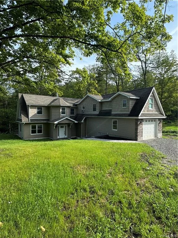 This serene paradise, completed in July 2024, offers tranquility like no other. Nestled between two lakes with streams and waterfalls, including a spectacular 10-foot drop, this home provides an unparalleled sense of calm. Step out through the rear French doors onto the stone patio to watch two streams converge and listen to the soothing sound of flowing water.  Inside, discover a custom kitchen with a six-burner chef&rsquo;s range and commercial-grade exhaust fan. The spacious kitchen seamlessly transitions into a living and dining area, divided by a stunning double-sided gas fireplace.  Ascending the two-story staircase, you&rsquo;ll reach the primary bedroom with a balcony overlooking the lake, a dressing room, two sitting/desk nooks, and a luxurious bathroom with a soaking tub, double vanity, and large shower. The upper floor also includes a hall bath with a soaking tub and walk-in shower, plus two additional bedrooms with vaulted ceilings and beautiful views.