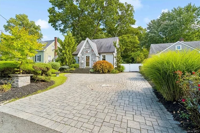 Welcome to this professionally landscaped 3-bedroom Cape Cod home, located on a desirable cul-de-sac in Nanuet. The charming paver driveway features a custom stone eagle inlay and creative stonework that sets the tone for this property. Step inside the new front entry door to find a cozy living room with classic arches. The main floor includes a primary bedroom and a spa bath complete with a jetted tub and separate walk-in shower. The kitchen designed with granite counters, 4-seat breakfast bar & stainless steel appliances. The adjacent dining room boasts a bay window with views of your private backyard oasis. Upstairs, you&rsquo;ll find two additional bedrooms and attic storage with potential for future expansion. The full basement offers a private laundry area, ample storage & endless possibilities. A mudroom at the rear provides direct access to a raised paver deck and patio. Enjoy your fenced, park-like property with a spacious pergola, fire pit, and serene koi pond with waterfall. Recent updates include a young roof & replacement windows, highlighting the home&rsquo;s excellent maintenance. This property awaits your personal touch. Schedule your tour today!