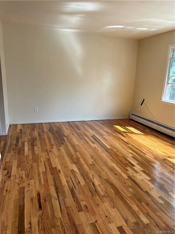 Newly renovated apartment in a private house. Features 3 bedrooms, 1and 1/2 bath, living room, formal dining room, eat in kitchen and adequate amount of closet space. Apartment is located on the 3rd floor, no elevators.