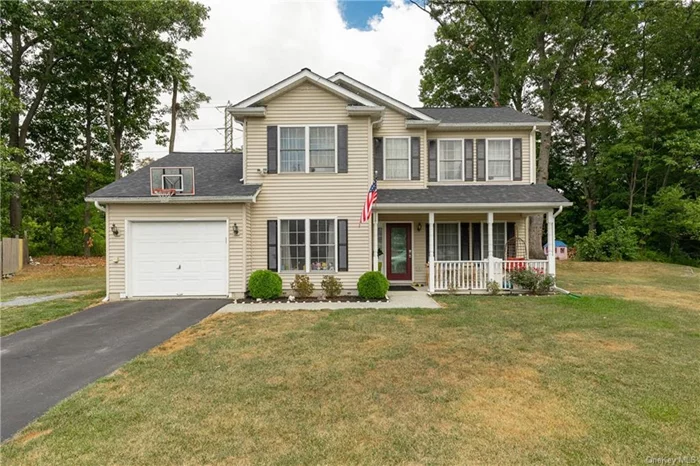 Well maintained and updated 3 bedroom, 2.5 bathroom Colonial situated in a private cul de sac located in the town of Poughkeepsie in the Hyde Park School District. Just minutes to Route 9, this home offers a great space to entertain and enjoy. Enter through the rocking chair front porch, into the large open living room with newer floors throughout that leads to your Den / home office and large eat in kitchen with breakfast bar and large pantry. The first floor also has a half bath / laundry room and access to the garage and a sliding door that leads to the private and large backyard. The second floor has all updated hardwood flooring, a master suite with large walk in closet and updated master bath with his and her sinks and beautiful new tile. The second floor is completed with two additional good size bedrooms, and another full bath with updated tiled shower. Worry free and low maintenance home with town water, town sewer, and natural gas! This house is just waiting for the perfect owner to call it home! Schedule a showing NOW before its gone !