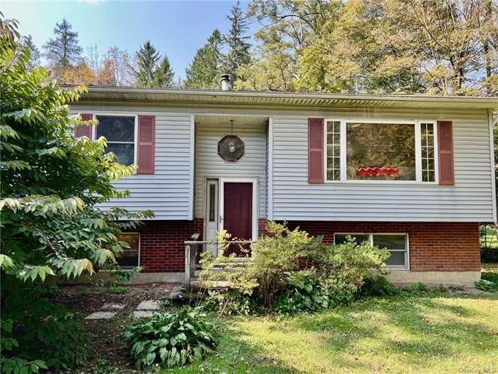 Four bedroom raised ranch in Millbrook School District. This house is located in Clinton Corners, close to commuter routes and in a location that is convenient for enjoying all that the Hudson Valley has to offer. Minutes to the Village of Millbrook and a short trip to Rhinebeck.