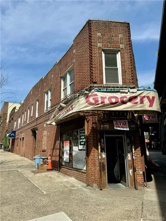 A corner mixed use building located in prime Borough Park. The brick building consists of approximately 3, 340 sf and will be DELIVERED VACANT. The building sits on an irregular lot which is approximately 1, 670sf. The property is zoned R6/C2-3. The first floor is currently configured as three small offices and one retail space, which can be easily combined as one large commercial space. The second floor is consists of two large Two (2) Bedroom apartments with plenty of light. The building has a spacious full basement for ample storage. The property is steps away from D train entrance and conveniently located near numerous transportation outlets.