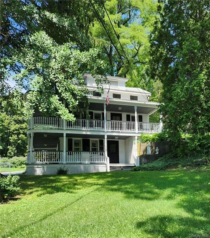 Turn back the hands of time with this beautiful home built in 1798 reminiscent of the deep south! It&rsquo;s 3 stories, two of which have gorgeous wrap around newly redone porches, that you can envision with rocking chairs, sipping mint juleps or enjoying a summer meal. The 3-story farmhouse has a newly refurbished kitchen, two living rooms, 3 bedrooms, two and a half bathrooms, a cozy fireplace and hardwood floors that add to its eloquence. All of this is situated on an acre of land with .46 of an acre across the road that has a babbling brook running through it. On the back of the property sits a 2-story renovated barn, perfect for an art studio or whatever your mind imagines with plenty of storage below. More than 90% of the property is newly fenced in perfect for dogs to run! There is also a back shed for mowers and such, a corn crib which is a rare find in Dutchess County these days, and a large tool shed off the patio next to the main house for storage or a he/she shed. A large portion of the lawn is flat, with outside electricity, perfect for tent parties, a gazebo or pool! This house and land are rich in local history and was a part of a large working farm back in the day known to the locals as Woodinville. Bring your imagination and dreams and come see this beautiful, rare & unique home! OWNER MOTIVATED!