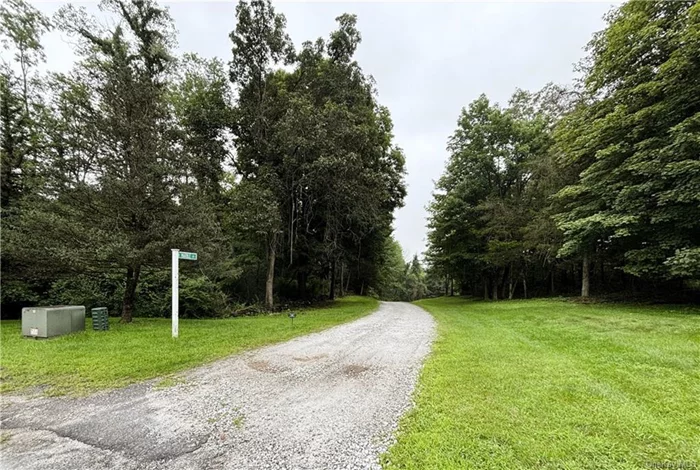 Explore this exceptional 4+ acre level lot on Estate Drive, nestled further into the peaceful Cushman Road subdivision in Pawling, NY. Enjoy the privacy of this serene setting while benefiting from shared access with two other similar properties via a common driveway. This lot is equipped with underground utilities and a well, offering a smooth building process. Located just 6 minutes from the charming Village of Pawling, you&rsquo;ll have easy access to delightful cafes, boutique shops, fine dining, and Metro-North Railroad&rsquo;s Harlem Line. Embrace the opportunity to create your ideal home in this tranquil, well-maintained community.