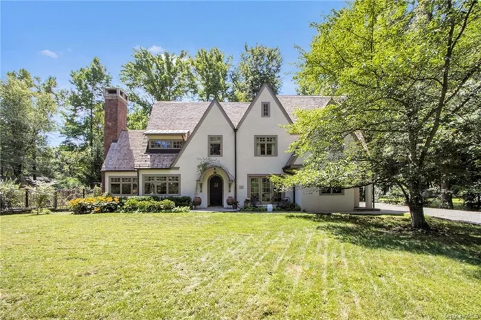 Three Gables. A turnkey circa 1930 home, situated in storied Snedens Landing, a historic district, with no thru traffic, that feels like the country, but is only 25 minutes to NYC!  Snedens consists of only about 100 homes, dating back to late 1600s and adjoins approximately 3, 000 acres of parkland, where one can walk or hike for miles. It&rsquo;s also a short walk to the Hudson River, down Washington Spring Rd, a major thoroughfare during the Revolutionary War. Three Gables is a beautifully renovated and dramatic, 1930s home, with many windows that provide lots of light all day. Feels like an English Country home. It was recreated by its two designers/owners, and features an abundance of subtle, yet highly stylized applications - hand painted walls, subtle wallpaper, complimentary paint palate,  custom ironwork, noteworthy lighting, and bold architectural features inside and out. The home features an asymmetrical exterior with three bays or sections that move forward, from south to north. Its many geometric shapes include triangular shaped gables, rectangles blocks, and semi-circles, both inside and out. In addition to period moldings, panel doors, coffered and vaulted ceilings, it features dramatic, custom designed metal work, custom lighting, airy, open stairwells, many French doors, and a large porch in rear off the dining room and kitchen. A massive fireplace with native brownstone is the focal point in the house, with original mahogany woodwork surround. The home also offers a lot of wall space for artwork. Another focal point is the very large kitchen. It has an old world country like European feel, with floor to ceiling, knotty pine cabinetry, with many glass front cabinets and two entry doors, to the back and side yard off driveway. In addition, there is lots of storage space, honed marble counters and top of the line brand appliances. The home is full of nooks and crannies and the beauty is that it&rsquo;s turnkey!! All bathrooms are classic marble or limestone. Third floor features an unfinished attic with windows that offer many options. The lower level offers a large laundry room with great workspace and additional storage. All mechanicals replaced recently. Includes generator too. The two-car garage and 2nd floor studio space, approx. 500sf, was added in 2015, ideal for home office. Nothing Compares to Three Gables!