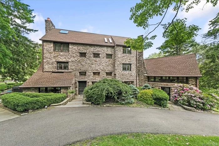 This distinguished stone-clad residence, designed by the acclaimed architect Aymar Embury II, stands as a beacon of historical and architectural significance. With five private sleeping areas, this home offers a sanctuary of comfort, harmoniously balancing seclusion and sophistication within its storied walls. As part of the renowned Fishkill Farms, the estate has served as a backdrop to history, once belonging to Henry Morgenthau Jr. and playing host to President Franklin Delano Roosevelt as a cherished hunting lodge. The home&rsquo;s preservation of its original Tudor style embodies a bygone era, while its luxurious modern living spaces offer a contemporary haven. The property is enveloped by the hushed beauty of twilight, with its noble gables and chimneys etched against the sky. The warm glow from its windows spills onto a landscape that is not only steeped in history but also adjacent to thousands of acres of public wilderness, beckoning with the promise of adventure and natural tranquility. This serene estate is ideally situated just a short drive from the charming Hudson River towns of Beacon and Cold Spring, renowned for their vibrant culture, boutique shopping, and gastronomic delights. Moreover, the home sits at the cusp of a region on the brink of a bright future. It is merely a 5-minute drive from the burgeoning semiconductor manufacturing hub, iPark 84, symbolizing the area&rsquo;s economic resurgence and the fusion of its rich past with a dynamic future. This residence offers more than a home; it is a confluence of past and future, of quiet country living and economic vitality. Here, you can immerse yourself in the tranquility of nature, the nostalgia of history, and the excitement of the area&rsquo;s growth and potential. It&rsquo;s an invitation to be part of a legacy and a community that is moving confidently towards a promising horizon.