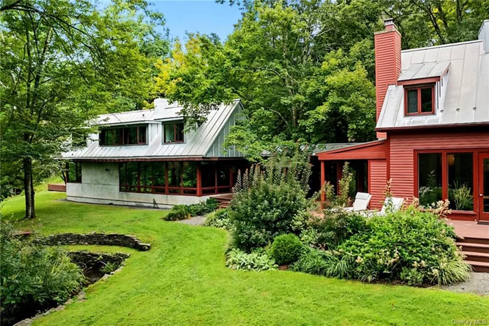 7-time AIA award winning architect Matthew Bialecki designed this home to be his personal residence. This masterpiece featuring natural organic materials, and constructed with green building strategies, is considered by architects to be one of the finest homes in the Hudson Valley. This stunning earth-bermed sustainable house combines energy efficiency with an awe-inspiring fusion of architecture and landscape. Surrounded by over 400 acres of forest and farmland, it offers both privacy and tranquility. Inside the home is a work of art that showcases mid-century glass architecture, fine woodworking, locally hand-hewn oak timber beams, floor to ceiling windows, and a 250ft board-formed concrete retaining wall. This home epitomizes the ultimate relaxation experience. Cozy up in front of one three magnificent fireplaces, rest outside listening to the sounds of the rippling creek, or rejuvenate and detox in your own spa-like private cedar sauna. Very motivated seller accepting all offers!